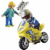 Boy with racing motorcycle.